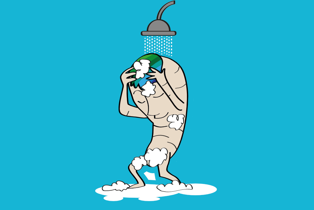 Bild på en tecknad pepparrot som står i duschen med löddrande tvål på kroppen.